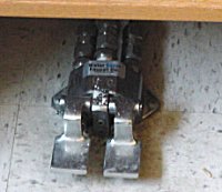 A two-pedal floor-mounted water control valve
