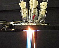 a burner being used to repair a multiport flange