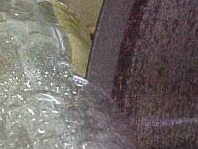 Closeup of diamond wheel on a glass sale
