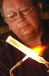 thumbnail image of a scientific glassblower at work