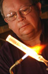 thumbnail image of a scientific glassblower at work